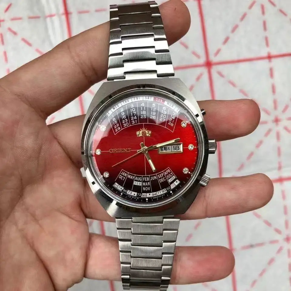 automatic mechanical unisex Orient watch with large rotating dial, fully functional stainless steel Japanese movement