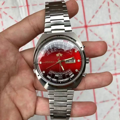 automatic mechanical unisex Orient watch with large rotating dial, fully functional stainless steel Japanese movement