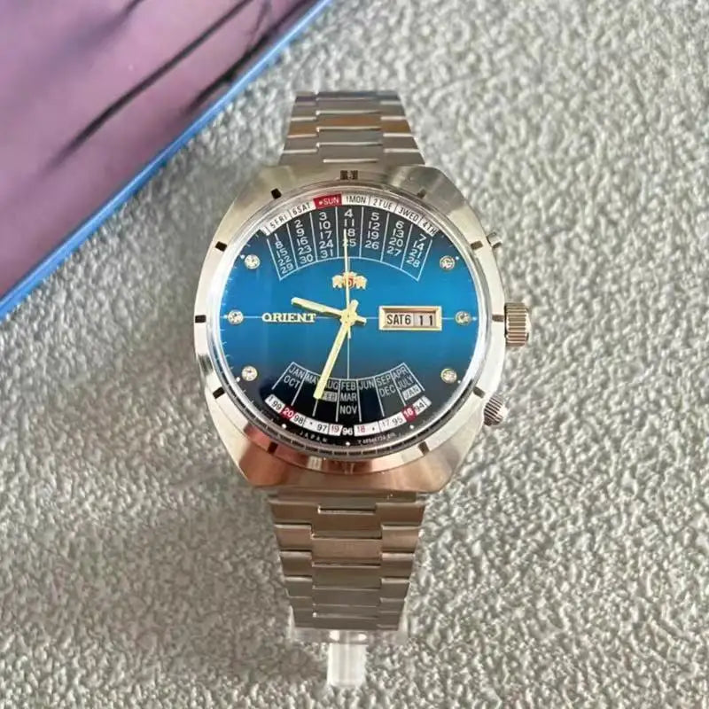 automatic mechanical unisex Orient watch with large rotating dial, fully functional stainless steel Japanese movement