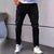 Men's American Retro Hole-Punched Stretch Slim Fit Jeans Zipper Casual Streetwear Denim Pants Classic Black Blue Skinny Trousers